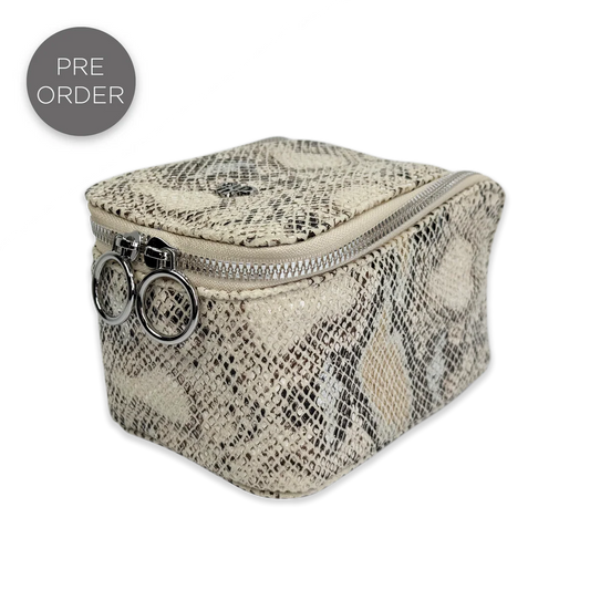PurseN Train Jewelry Case in cream snake-print nylon with gold hardware and dual ring holders