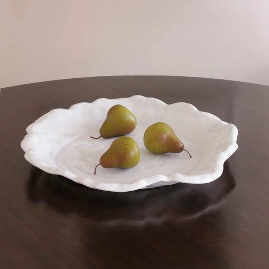 Beatriz Ball Vida Havana Extra Large Round Platter in white with organic ruffled edges, holding pears