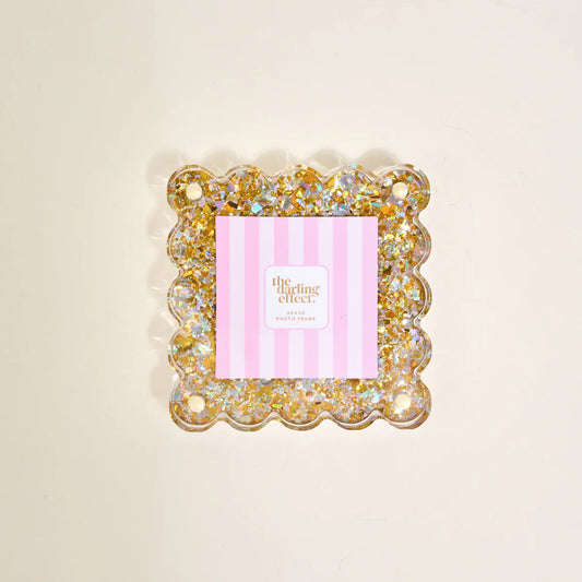 The Darling Effect Little Moments square acrylic picture frame with gold glitter interior and scalloped edges