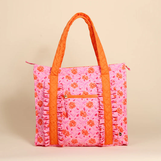 The Darling Effect Everyday Quilted Tote Bag in pink with orange floral print and ruffled trim