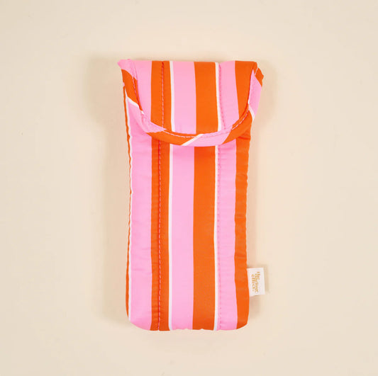 The Darling Effect Puffy Sunglasses Case in pink and orange vertical stripes with rounded handles