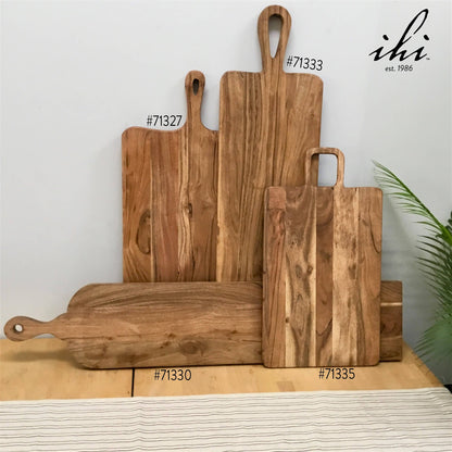 Collection of India Handicrafts Inc wooden cutting boards and serving boards in various sizes and shapes