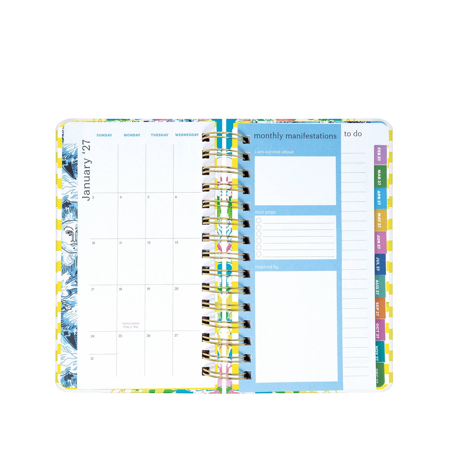 The Lilly Pulitzer by Lifeguard Press - Medium 17 Month Agenda, Lovely Lilly features an open spiral-bound design with a monthly calendar for January 2024 on the left and dedicated sections on the right for monthly manifestations, to-do lists, and easy-to-find categorized tabs along the page edge—ideal for lovers of colorful organization or anyone looking to add that signature Lilly Pulitzer agenda charm to their planning routine.