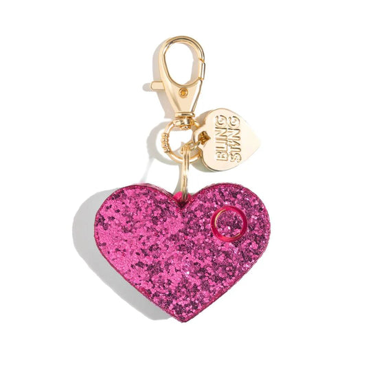 Bling Sting hot pink glitter heart safety alarm with gold clasp and charm tag