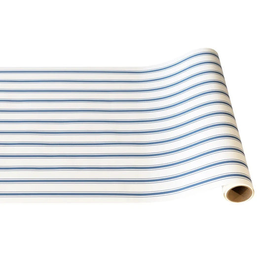 Hester & Cook Cornflower Blue Linen Stripe paper table runner rolled with blue and white striped pattern