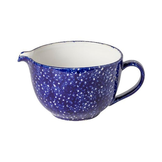 Casafina Abbey Blue batter bowl with deep blue speckled glaze, cream interior, and curved pouring spout