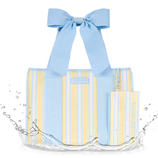 Case-Mate Cabana Stripe Bow Jelly Tote in blue and yellow stripes with light blue ribbon handles and bow, shown with water splashing