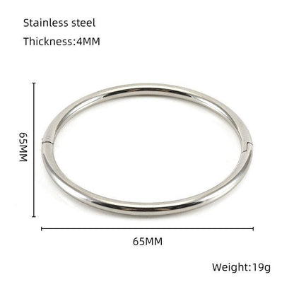 Introducing the Mio Queena - Multi-style 18K Gold-plated Stainless Steel Bangle - FGS: This elegant bangle by Mio Queena features a 65mm diameter and a sturdy 4mm thickness, weighing just 19g. The top-view image highlights its precise measurements, making it an ideal choice for a thoughtful jewelry gift.