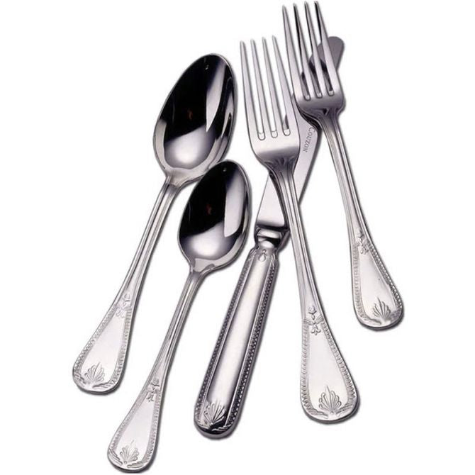 Five pieces of Couzon "Consul" Stainless Flatware—including two spoons, two forks, and a knife—are arranged overlapping each other on a white background. Each piece features the brand’s distinctive decorative handle pattern.