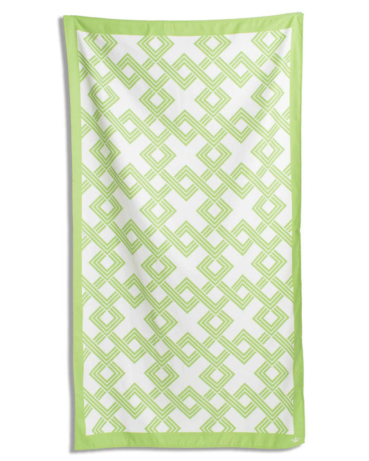 The Royal Standard Savannah Giant Beach Towel with lime green border and white center featuring interlocking diamond pattern