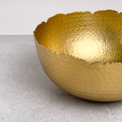 India Handicrafts Inc Large Gilded Hammered Bowl side detail of hammered circular pattern and wavy edge