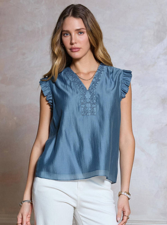 Current Air Embroidered Ruffled Short Sleeve Blouse in slate blue with V-neckline and flutter sleeves, front worn view