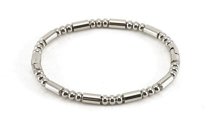 Introducing the Mio Queena - Multi-style 18K Gold-plated Stainless Steel Bangle by Mio Queena, shown on a white background—a stylish and elegant accessory crafted with alternating small round and cylindrical beads. This versatile bangle makes an ideal jewelry gift or the perfect choice to elevate any ensemble.