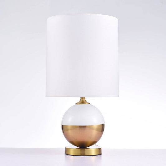Pasargad Home Senato table lamp with white cylindrical shade, white and bronze-gold spherical base, and brass finial, unlit