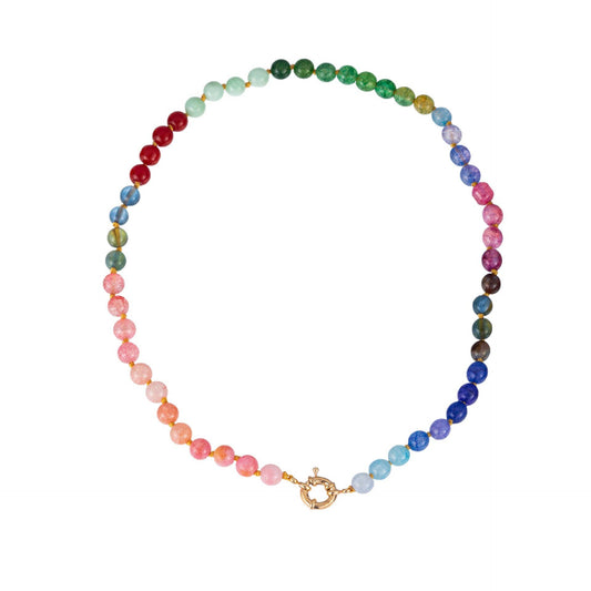 JOSSLYN by wall to wall beaded necklace laid flat displaying full rainbow color gradient with gold toggle clasp