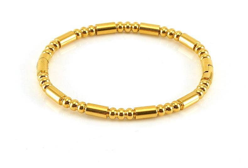 Introducing the Mio Queena - Multi-style 18K Gold-plated Stainless Steel Bangle - FGS by Mio Queena, featuring alternating small round and cylindrical beads arranged in a simple, elegant circular design. Displayed on a white background, this stylish piece is an ideal choice for jewelry gifts.