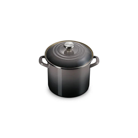 Le Creuset 8qt stockpot in black enameled cast iron with matching domed lid and handles