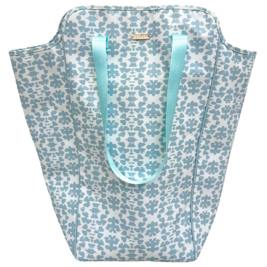 Laura Park Designs Chintz Mist laundry bag with turquoise and blue floral pattern and mint green handles, front view