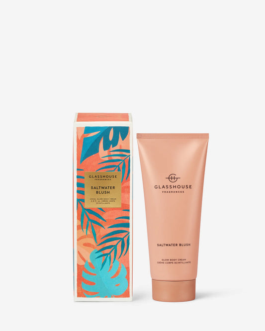 Glasshouse Saltwater Blush body glow cream in nude tube with tropical leaf patterned coral box