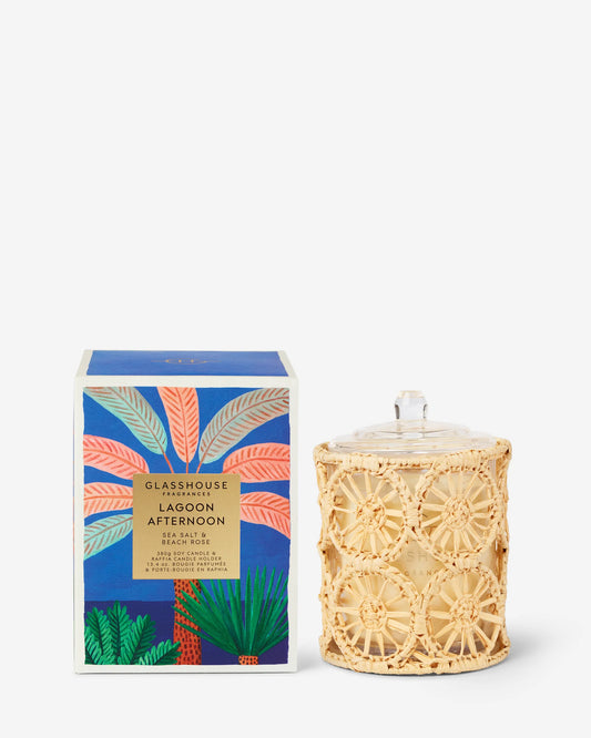 Glasshouse Lagoon Afternoon 13.4 oz candle in cream textured jar with colorful leaf patterned blue box