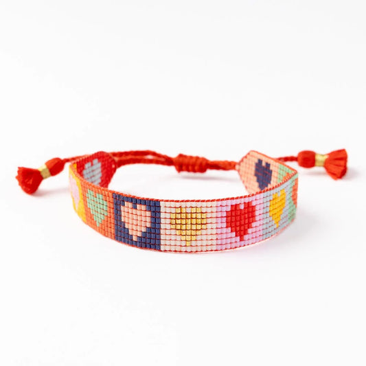 Ink + Alloy Gabby adjustable beaded bracelet with multicolor heart pattern and red cord