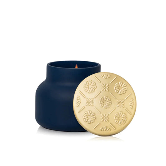 Capri Blue Artisan Terrazza Velluto Petite Candle, dark navy ceramic vessel with gold embossed lid featuring floral pattern