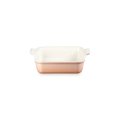 Le Creuset Heritage Square Dish in shell pink with cream interior and clear handles