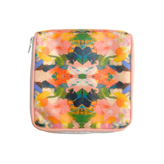 Laura Park Jewelry Case front view with colorful kaleidoscope floral pattern in orange, yellow, and blue