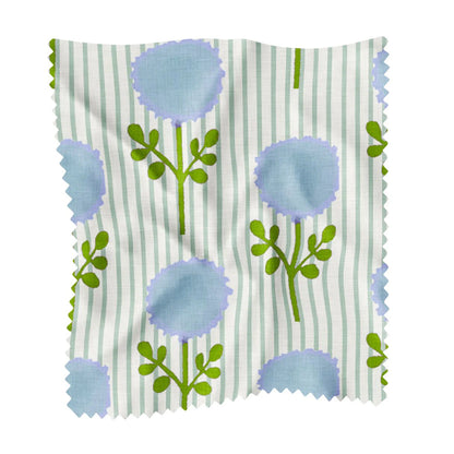 The Laura Park Marigold Ticking Stripe Blue Fleece Blanket from Laura Park Designs showcases a cozy white fabric adorned with light green vertical stripes and a charming pattern of stylized blue flowers with green stems and leaves. Zigzagged edges add extra appeal, making this piece perfect inspiration for your next fleece blanket project.