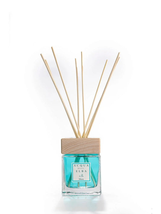 Acqua Dell Elba Mare reed diffuser with natural wood reeds in turquoise liquid glass vessel