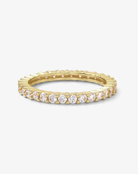 Melinda Maria Baby Heiress Ring in gold with continuous row of round cubic zirconia stones and decorative band