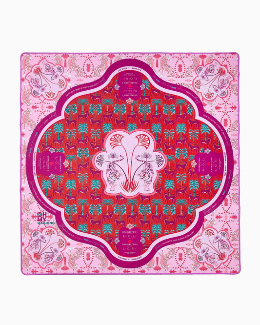 Oh My Mahjong Mirage Mat with pink background, magenta scalloped border, and red center with turquoise palm trees