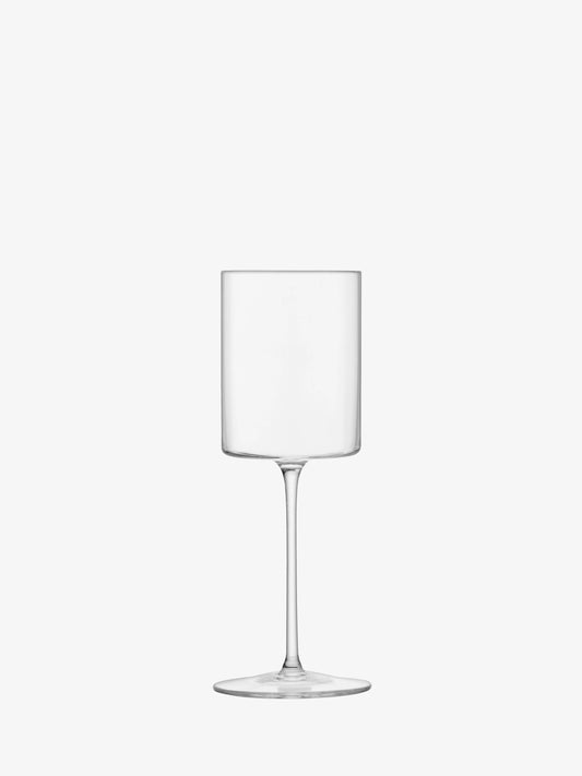 The LSA "Otis" White Wine Glass by LSA is a clear, cylindrical handmade stemware piece with a tall stem and a flat, round base, shown against a plain white background.