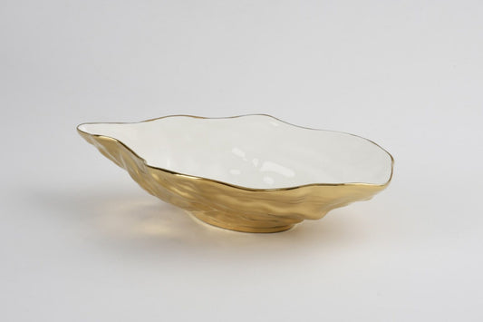 Pampa Bay Medium Oyster Bowl with white interior and brushed gold exterior, organic curved shape