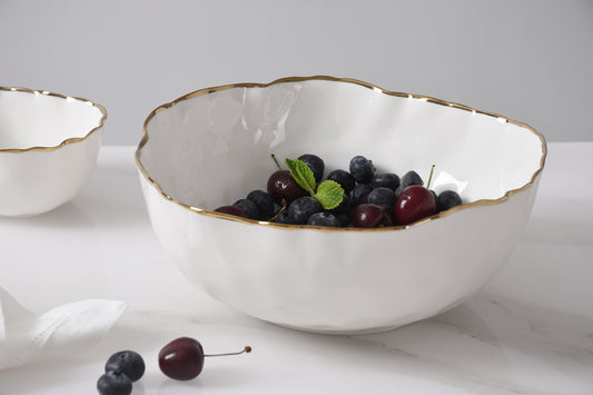 Pampa Bay Portofino Medium Bowl in white porcelain with gold rim filled with mixed berries